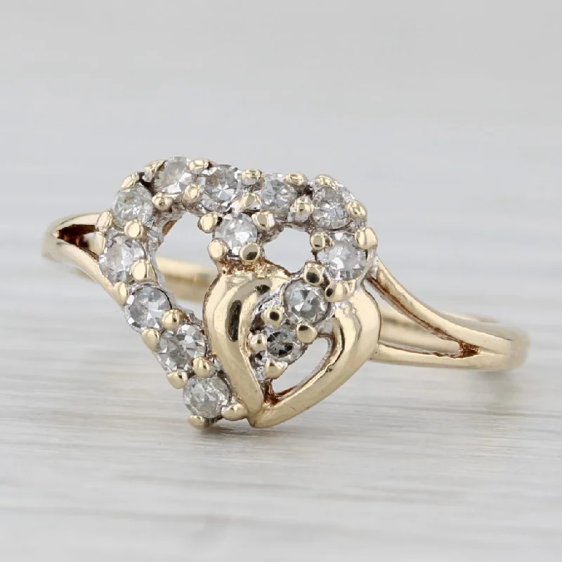 two-tone engagement rings for women-0.15ctw Diamond Interlocking Hearts Ring 10k Yellow Gold Size 4.5